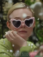 Elle Fanning wears I Do Crew wedding party sunglasses in the AppleTV+ series Margo's Got Money Troubles.