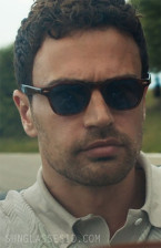 Theo James wears Jacques Marie Mage Zephirin sunglasses with blue lenses in Season 2 of The Gentlemen.