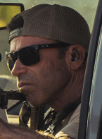 Taylor Sheridan wears a pair of Oakley Holbrook OO9102 sunglasses in the series Lioness.
