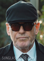 Pierce Brosnan as Conrad Harrigan wears Oliver Peoples Merceaux OV5498SU sunglasses in MobLand.