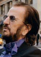 Musician Ringo Starr wears Oliver Peoples The Row Aero L.A. sunglasses in the music video for his new song Long Long Road