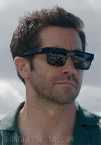 Jake Gyllenhaal wears Prada PR 19WS sunglasses in the Guy Ritchie movie In The Grey.