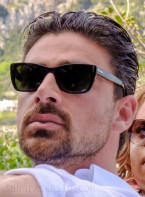 Michele Morrone wears Ray-Ban RB2248 Caribbean sunglasses in the film Another Simple Favor.