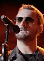 Country music singer-songwriter Eric Church often wears Ray-Ban RB3025 Aviator sunglasses while performing on stage.