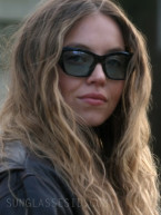 Sydney Sweeney wears Tiffany TF4230 sunglasses in the movie The Housemaid.