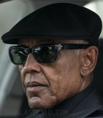 Giancarlo Esposito wears black wayfarer style sunglasses in Parish.