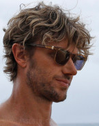 Adam Demos (Will Ready) wears brown semi-transparent sunglasses in Rescue HI-Surf.
