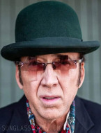 Nicolas Cage wears unique cross-shaped sunglasses in the movie Gunslingers