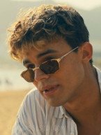 Matthew Broome wears a pair of gold/tortoise sunglasses in My Fault: London (2025).