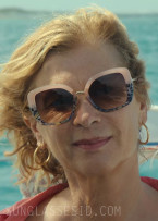 Michèle Laroque wears Pink and Leopard sunglasses in the movie Honeymoon Crasher.