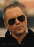 Sam Rockwell wears a pair of Ray-Ban RB3025 Aviator sunglasses in The White Lotus Season 3 Episode 6