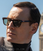 Michael Fassbender wears a second pair of sunglasses in Black Bag (2025) that is not yet identified.