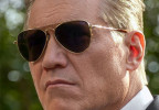 Holt McCallany wears American Optical Fletcher aviator sunglasses in Episode 4 of the Netflix series The Waterfront.