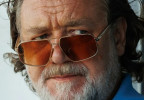 Russell Crowe wears David Beckham DB7102 sunglasses in The Get Out.