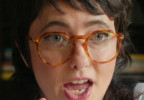 Sarah Sherman wears Persol PO3281V eyeglasses in the Netflix film Roommates.