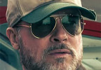 Brad Pitt wears Ray-Ban Outdoorsman sunglasses and Talkeetna Bush Pilot Hat in the 2026 movie Heart of the Beast.