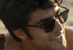 Shubham Maheshwari wears black sunglasses in the series We Were Liars (2025).