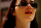 Emma Stone as Bella Baxter wears custom sunglasses in Poor Things.