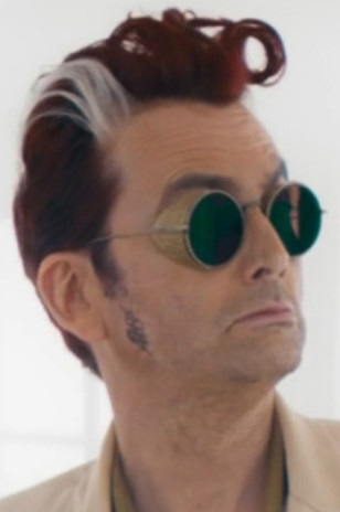 David Tennant wears Gold side shield sunglasses in Good Omens Season 3.