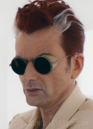 David Tennant wears Gold side shield sunglasses in Good Omens Season 3.