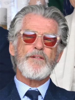 Pierce Brosnan wears Jacques Marie Mage Enzo sunglasses during the Wimbledon tennis tournament in 2024.