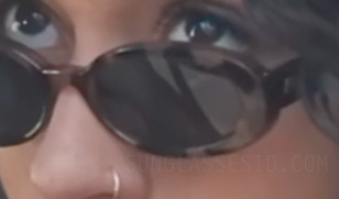 In this enhanced detail we can just spot the icon on the temples, showing us that this is the Le Specs Outta Love model.