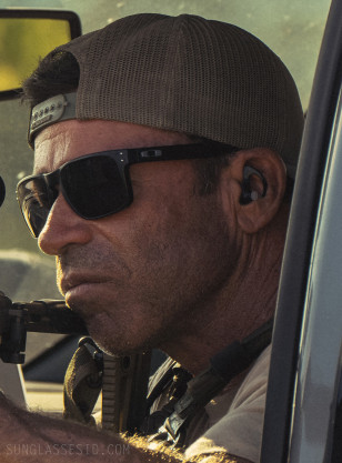 Taylor Sheridan wears a pair of Oakley Holbrook OO9102 sunglasses in the series Lioness.