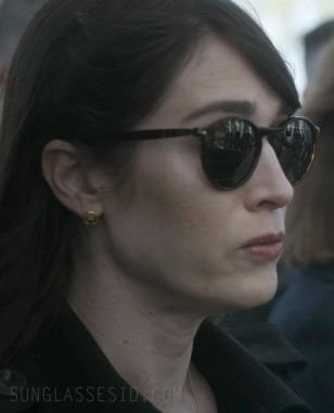 Lizzy Caplan wears Persol PO3285S sunglasses in Zero Day.