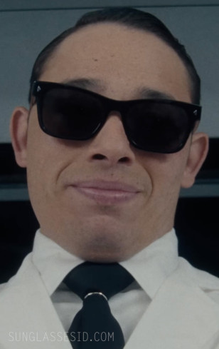 Anthony Ramos wears Prada PR A17S sunglasses in The Beauty.