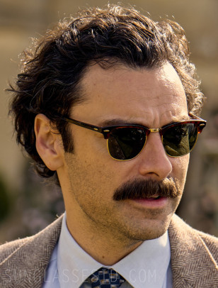 Aidan Turner wears Ray-Ban RB3016 Clubmaster Classic sunglasses in the series Rivals (2024).