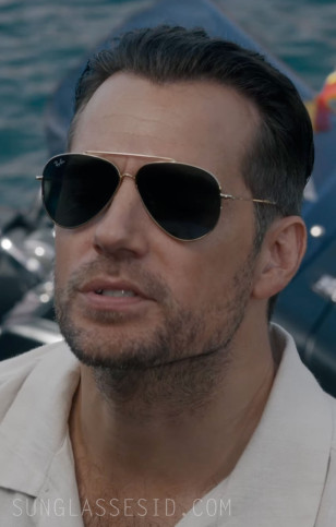 Henry Cavill wears Ray-Ban RBR0101 Reverse Aviator sunglasses in the movie In The Grey (2026).
