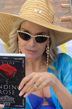 Michelle Pfeiffeis wearing Swarovski SK7030 sunglasses on the set of the series Margo's Got Money Troubles.