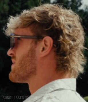 Here we can see that Logan Paul wears the Tom Ford Rosco with grey transparent frame.