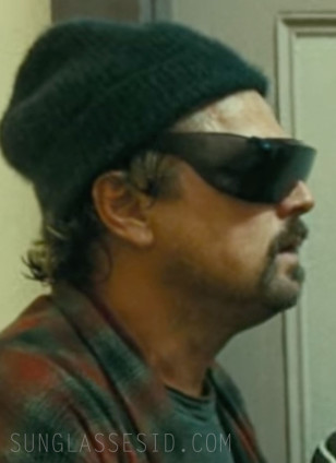 Leonardo DiCaprio wears Wise Cover-Ups Black Fit Over Sunglasses in the movie One Battle After Another.