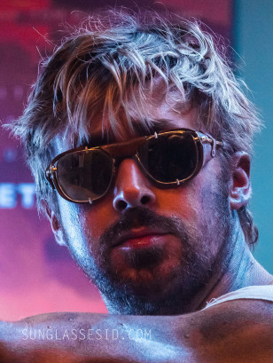 Ryan Gosling wears gold American Optical Original Pilot sunglasses with leather side shields in The Fall Guy.