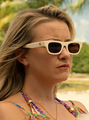 Meredith Hagner wears Anine Bing Otis sunglasses in the series Bad Monkey.