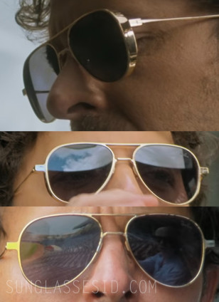 Manolo Cardona as Danger Carmelo wears gold aviator sunglasses in Medusa.
