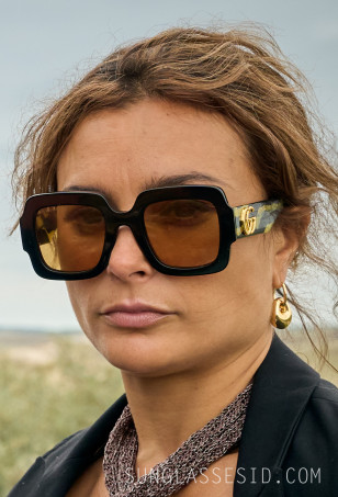 Charlie-Chan Dagelet wears Gucci GG1547S sunglasses in the series The Perfect Lie.
