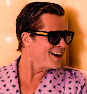 Brad Pitt wears Jacques Marie Mage RItz sunglasses with a black frame in GQ Magazine.