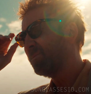 Nicolas Cage wears OTIS Test Of Time X sunglasses in The Surfer.