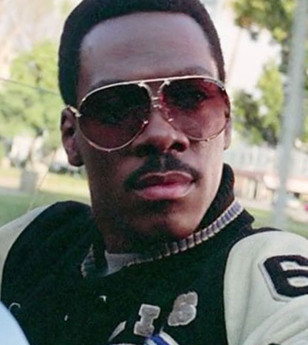 Eddie Murphy wears Porsche Design by Carrera 5621 sunglasses in the movie Beverly Hills Cop II.