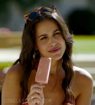 Hedy Nasser wears Ray-Ban RB2186 State Street sunglasses in The Idea Of You.