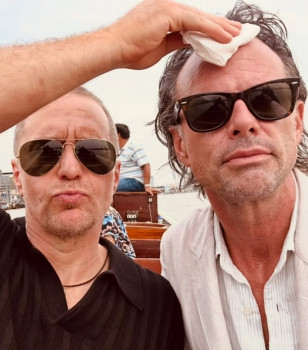 Sam Rockwell wears a pair of Ray-Ban RB3025 Aviator sunglasses in The White Lotus Season 3 - here pictured behind the scenes with co-star and real-life friend Walton Goggins.