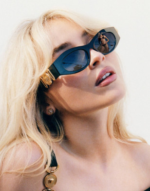 Sabrina Carpenter wears black Versace VE4480U Medusa sunglasses in a new Versace ad campaign.