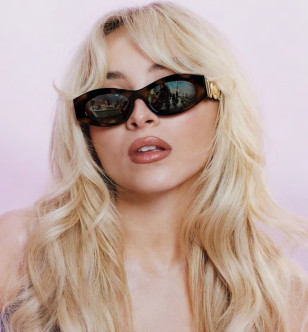 Sabrina Carpenter wears tortoise Versace VE4480U Medusa sunglasses in a new Versace ad campaign.